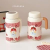 Bình giữ nhiệt 1.000ml nắp vặn Hàn Quốc, khay lọc trà, quai cún caro đỏ - Giá 125k