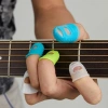 Bộ 4 Găng Tay Bảo Vệ Ngón Tay Guitar & Ukulele Silicon Thimble Chống Trượt 7
