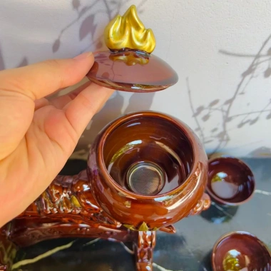 Bộ ấm chén trà Trâu Vàng xoay 360 độ độc đáo - thiết kế mộc mạc, gắn liền quê hương, giá ưu đãi 885.000₫