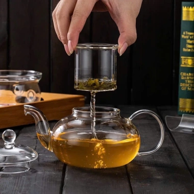 Bộ ấm trà thủy tinh trong suốt 600ml lõi lọc & đế nến sang trọng, giảm giá 155k