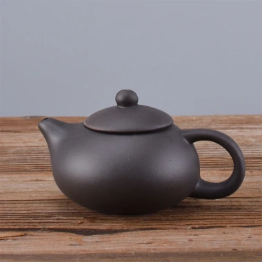 Bộ Ấm Uống Trà Zisha Elegance 4 Chén - Hộp Chống Sóc - Chén Gốm Nâu Đậm 60.822 VND 6 Bộ Ấm Uống Trà Zisha Elegance 4 Chén - Hộp Chống Sóc - Chén Gốm Nâu Đậm 60.822 VND 6