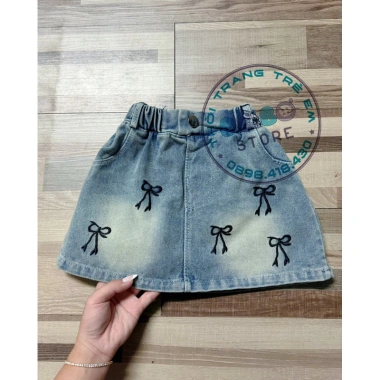 Bộ áo thun ba lỗ JIL SANDER và chân váy jean nơ thêu siêu đáng yêu cho bé gái - Giá chỉ 109.000₫