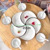 Bộ bát đĩa sứ decor hoa mặt trời: Sét đĩa mặt trăng 5 cánh trắng viền đen 42cm, giá 85.000₫ 2