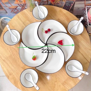 Bộ bát đĩa sứ decor hoa mặt trời: Sét đĩa mặt trăng 5 cánh trắng viền đen 42cm, giá 85.000₫ 2