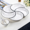 Bộ bát đĩa sứ decor hoa mặt trời: Sét đĩa mặt trăng 5 cánh trắng viền đen 42cm, giá 85.000₫ 3
