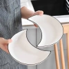 Bộ bát đĩa sứ decor hoa mặt trời: Sét đĩa mặt trăng 5 cánh trắng viền đen 42cm, giá 85.000₫ 6