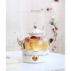 Bộ Bình Trà Ấm Chén kèm khay, lót tách, bếp châm trà viên vàng - Giá ưu đãi 1.268.000 VND 8