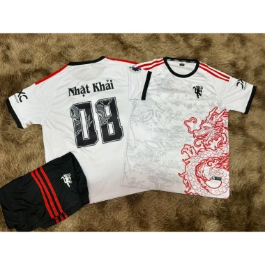 Bộ quần áo bóng đá Mu Dragon trắng - Vải thun lạnh thoáng mát, logo thêu, in tên số theo yêu cầu, chỉ 95.000₫