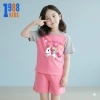 Bộ quần áo thun bé gái màu hồng, phông in đa hình 15-40kg - giảm còn 180.000₫