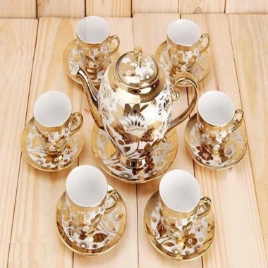 Bộ Tách Trà Nhũ Vàng Gốm Sứ Cao Cấp 6 Ly, 1 Ấm, 7 Đế - Giá Ưu Đãi 193.644₫