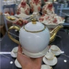 Bộ trà 10 chén - đĩa lót trắng viền vàng, tách phà, hộp quà - Giá chỉ 695.000 VND 2