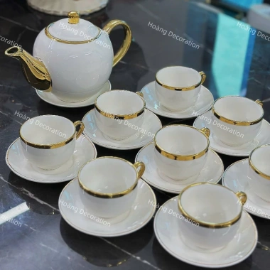 Bộ trà 10 chén - đĩa lót trắng viền vàng, tách phà, hộp quà - Giá chỉ 695.000 VND