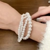 Bộ vòng tay và dây chuyền ngọc trai nhiều lớp phong cách Pháp Retro thanh lịch cho nữ, giá ưu đãi 113.740₫ 7
