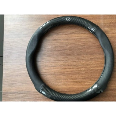 Bọc vô lăng Carbon da vân, đục lỗ thoáng khí cho Mazda 2, 3, 6, CX5, BT50, CX8, CX30 - Giá 129.000 VND 7 Bọc vô lăng Carbon da vân, đục lỗ thoáng khí cho Mazda 2, 3, 6, CX5, BT50, CX8, CX30 - Giá 129.000 VND 7