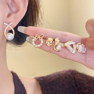 Bông tai đuôi cá nơ ngọc trai retro thời trang, thanh lịch - Giá chỉ 50.760₫
