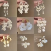 Bông tai ngọc trai rủ dây mặt hoa trắng phong cách Pháp thời trang nữ 27.260 VND