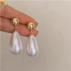 Bông tai retro giọt nước ngọc trai đa năng, nhẹ sang, phù hợp đầm, giá 47.317₫ 4
