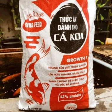 Cám cá koi 1kg 42% đạm tăng size tăng màu không vàng dầu giá ưu đãi 40.000 VND