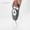 Cân lò xo treo tay nhựa 35kg - Cầm tay, kèm thước đo hành lý, giá chỉ 111.100₫