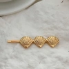 Cặp kẹp tóc biển cả hình sao và vỏ sò mạ vàng bạc sang trọng T6 - Giá 60.900 VND 6