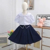 Chân váy học sinh bé gái cấp 1-2 cotton lụa mềm, kèm quần bảo hộ, giá 84.590₫