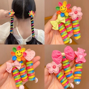 Cột tóc lò xo xoắn màu cầu vồng đính hoa, Nơ dễ thương cho bé - Giá chỉ 15.000đ