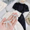 Đầm dự tiệc đen trắng xếp li Kora Dress – Thân mỏng, tag đá, chỉ 182.699₫ 6