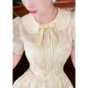 Đầm hoa vàng xòe tay ngắn công sở - Thanh lịch, eo tôn dáng, Lux W