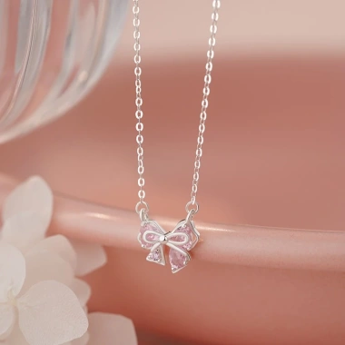 Dây chuyền bạc nữ 999 Calae nơ thắt đá hồng charm nhẹ nhàng - Giá 509.000đ