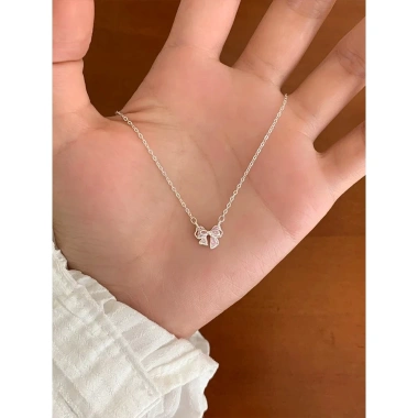 Dây chuyền bạc nữ 999 Calae nơ thắt đá hồng charm nhẹ nhàng - Giá 509.000đ
