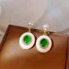 Dây chuyền và bông tai hình học retro, ngọc trai giọt nước thời trang – 85.473₫ 12