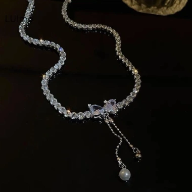 Dây chuyền vòng cổ nơ ngọc trai punk Y2K - kim cương giả sáng bóng, giá 38.400₫ 4 Dây chuyền vòng cổ nơ ngọc trai punk Y2K - kim cương giả sáng bóng, giá 38.400₫ 4