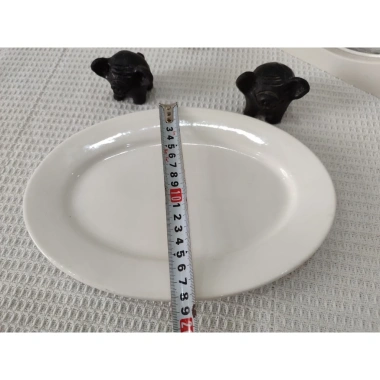 Đĩa sứ trắng hình bầu dục 10 inch - Gốm sứ cao cấp, chịu nhiệt tốt, giá 30.000₫ 5 Đĩa sứ trắng hình bầu dục 10 inch - Gốm sứ cao cấp, chịu nhiệt tốt, giá 30.000₫ 5