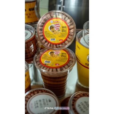 Hạt điều rang muối 1kg Hộp tròn xếp hoa - To đều, nguyên hạt A Cồ - Thành Huế - Giảm giá 240.000₫
