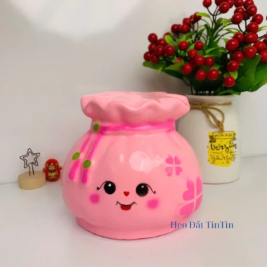 Heo đất tiết kiệm lỗ tròn túi tiền tài lộc - Quà tặng trang trí giá 55.000₫ 3 Heo đất tiết kiệm lỗ tròn túi tiền tài lộc - Quà tặng trang trí giá 55.000₫ 3