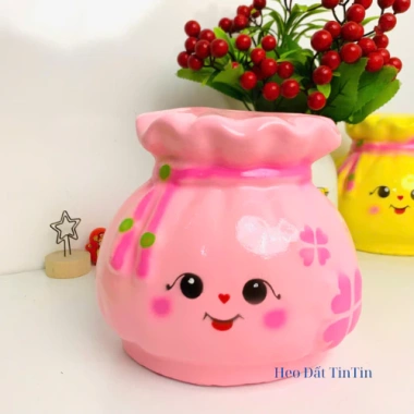 Heo đất tiết kiệm lỗ tròn túi tiền tài lộc - Quà tặng trang trí giá 55.000₫