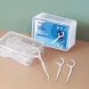 Hộp 50 tăm chỉ nha khoa tiệt trùng, sợi chỉ mành, vệ sinh răng miệng sau ăn - 12.900đ