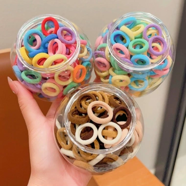 Hũ 100 Dây Buộc Tóc Cao Su Mềm Co Giãn Nhiều Màu Dành Cho Bé - Giá 22.000 VND 6 Hũ 100 Dây Buộc Tóc Cao Su Mềm Co Giãn Nhiều Màu Dành Cho Bé - Giá 22.000 VND 6