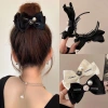 Kẹp tóc đen hình nơ đính hoa trà trắng thời trang cho nữ - Giá ưu đãi 41.450₫