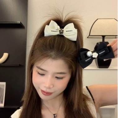 Kẹp tóc đen hình nơ đính hoa trà trắng thời trang cho nữ - Giá ưu đãi 41.450₫