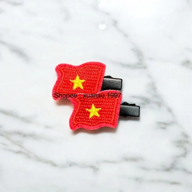 Kẹp tóc lá cờ Việt Nam 50 chiếc - Giá sỉ 129k (giảm từ 161k) - Cờ đỏ sao vàng