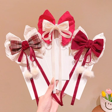 Kẹp tóc nơ lớn ren ngọc trai đỏ năm mới cho bé ruy băng tua rua mặt sau siêu cổ tích