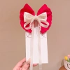 Kẹp tóc nơ lớn ren ngọc trai đỏ năm mới cho bé ruy băng tua rua mặt sau siêu cổ tích 5