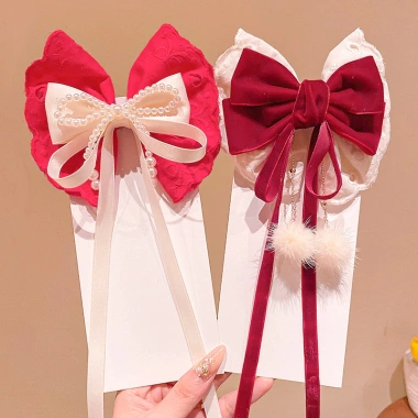 Kẹp tóc nơ lớn ren ngọc trai đỏ năm mới cho bé ruy băng tua rua mặt sau siêu cổ tích