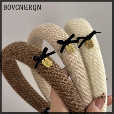 Kẹp tóc vải nâu có nơ cao đầu - Đa năng, đơn giản, giá ưu đãi 64.260 VND
