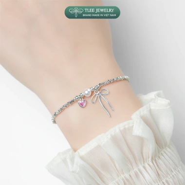 Lắc tay bạc nữ TLEE – Hạt bạc vỡ, charm nơ thắt, trái tim đá hồng, giảm 17%