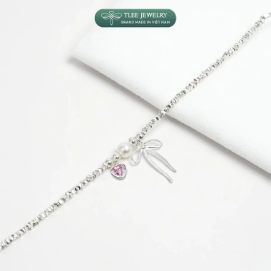 Lắc tay bạc nữ TLEE – Hạt bạc vỡ, charm nơ thắt, trái tim đá hồng, giảm 17%