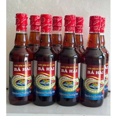 Lốc chai tròn nhựa tiết kiệm nước mắm cá cơm loại 1 Bà Hai 8 chai 500ml - Giá 293.400₫ 2