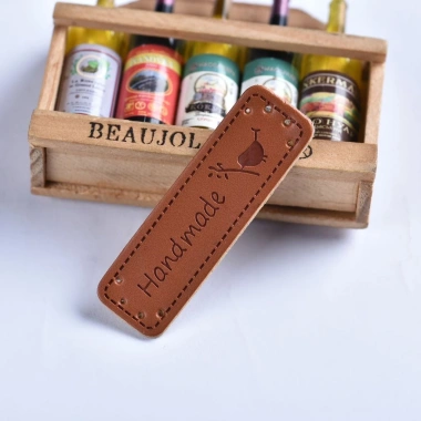 Mác da handmade trang trí thủ công, mẫu ngẫu nhiên, giá ưu đãi 8.000đ 2 Mác da handmade trang trí thủ công, mẫu ngẫu nhiên, giá ưu đãi 8.000đ 2