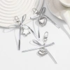 Móc khóa da bạc thời trang nơ trái tim Bowknot Charm Pendan giá ưu đãi 36.058 VND 6